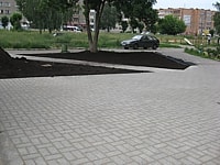 Выложена брустчака на площади